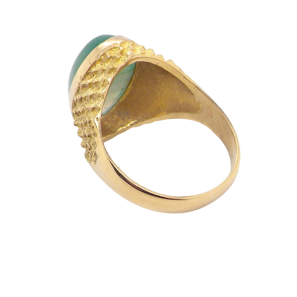 rear A pretty dress ring. Set with a cabouchon cut banded green agate , colours from jade green with stripes down to the base turning to white.