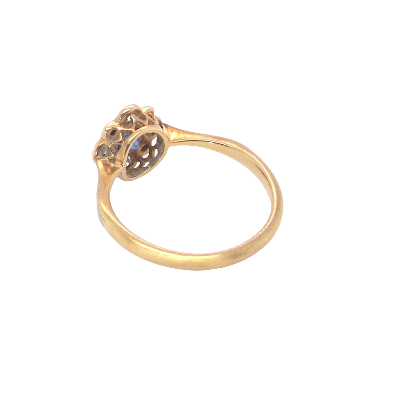rear A pretty early 20th century cluster ring. The centre stone a square mid blue sapphire, 3x3mm, mille grain setting. 