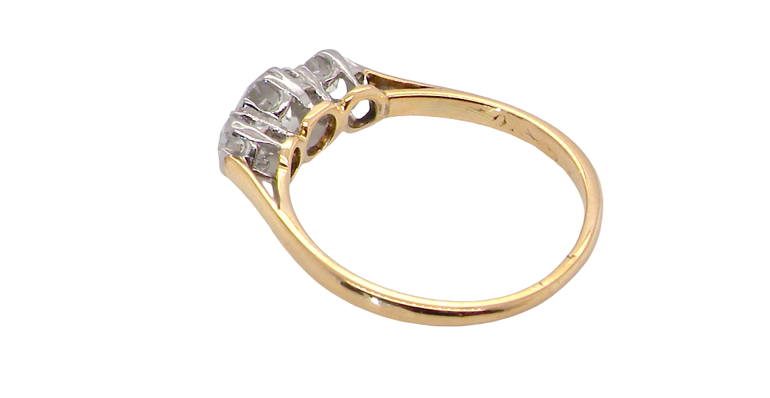 rear A pretty three stone trilogy ring that features three brilliant cut white diamonds.
Centre diamond, 5mm (est 0.50 carats) each side a 4mm diamond (est 0.25 carats). Colour G-h, clarity Si. Platinum rim style setting, head measures 12.7x5.3mm, depth 5.3mm, weight 2.4grams.