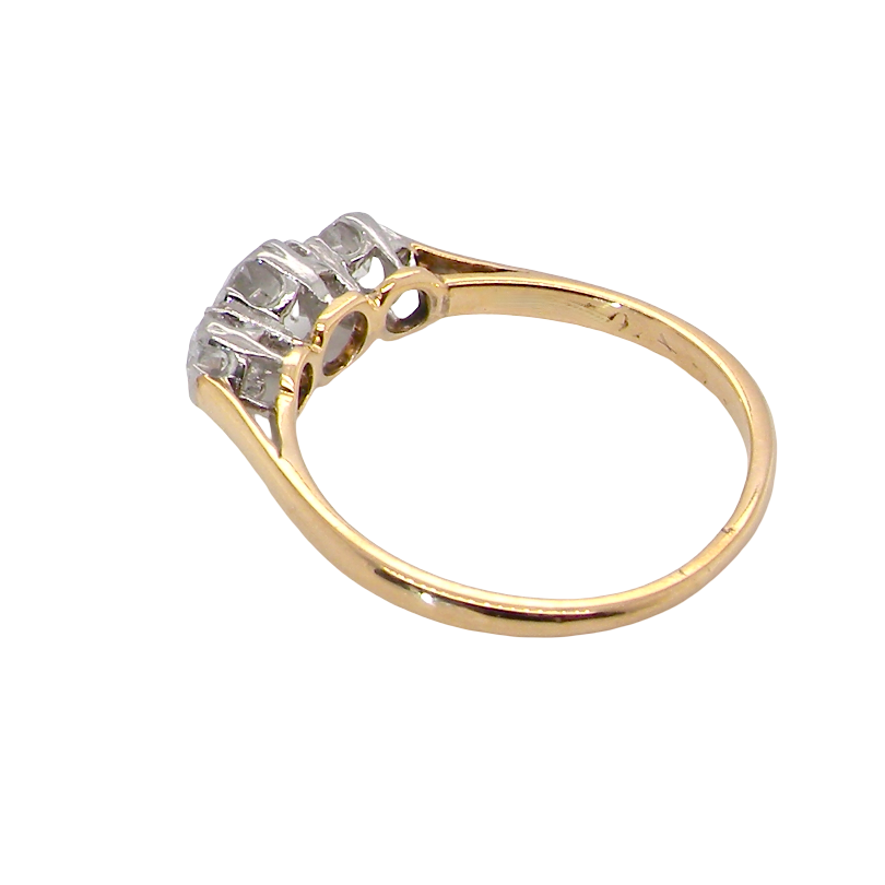 rear A pretty three stone trilogy ring that features three brilliant cut white diamonds.
Centre diamond, 5mm (est 0.50 carats) each side a 4mm diamond (est 0.25 carats). Colour G-h, clarity Si. Platinum rim style setting, head measures 12.7x5.3mm, depth 5.3mm, weight 2.4grams.