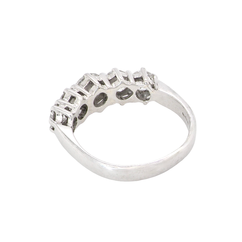 rear A stunning half hoop ring featuring five exceptional brilliant-cut white diamonds, expertly claw set in 18ct white gold.
The centre diamond measures approximately 5.8mm (estimated 0.70 carats), flanked by a 5.0mm diamond on each side, with 4.5mm diamonds at each end.