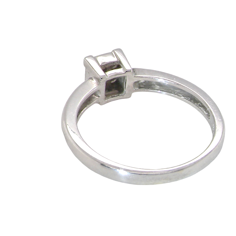 rear A stylish modern 18 carat white gold diamond cluster ring, with a beautifully clean and understated design.
The square-shaped head is set with four Princess cut white diamonds,