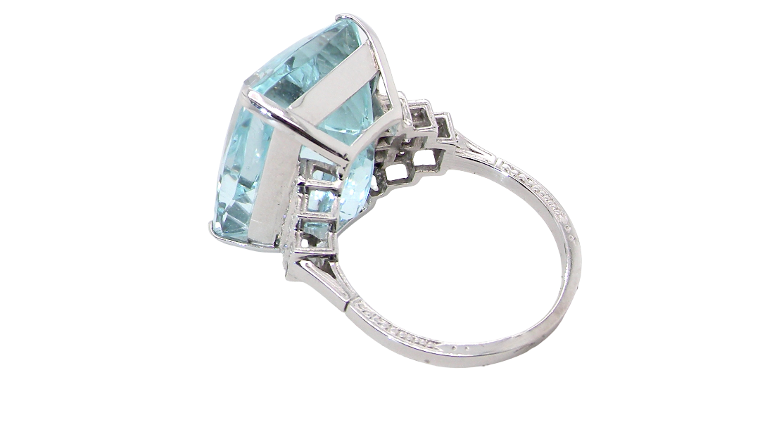 rear A truly spectacular vintage statement ring, centred with an impressive rectangular-cut aquamarine of exceptional proportions. Measuring approximately 18 x 13mm with a depth of 11mm, the aquamarine is estimated to weigh around 18 carats