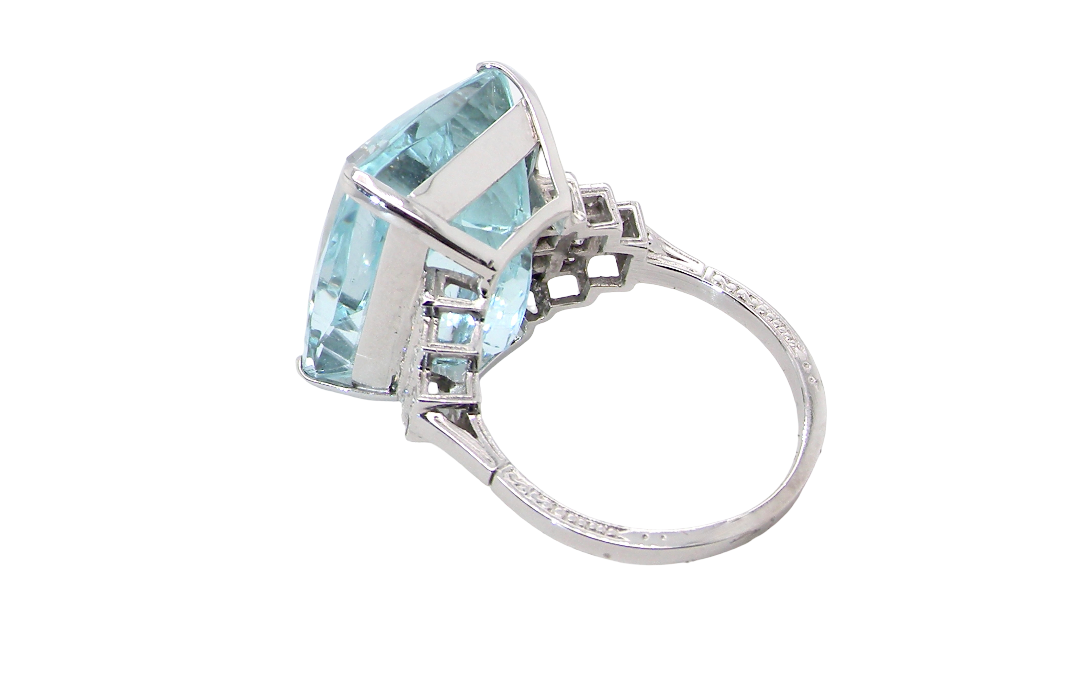 rear A truly spectacular vintage statement ring, centred with an impressive rectangular-cut aquamarine of exceptional proportions. Measuring approximately 18 x 13mm with a depth of 11mm, the aquamarine is estimated to weigh around 18 carats