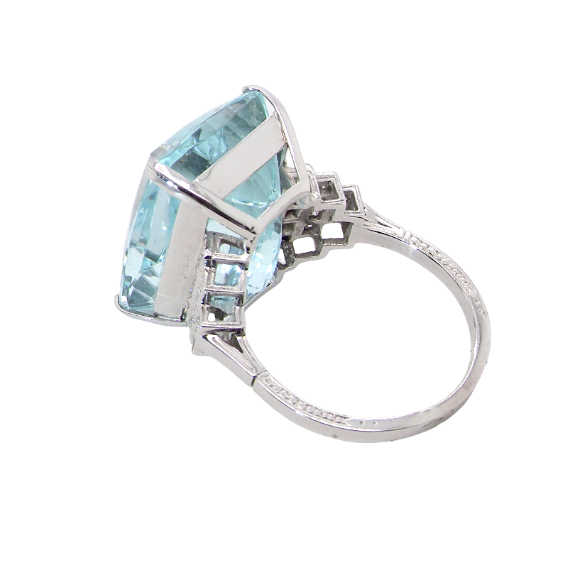rear A truly spectacular vintage statement ring, centred with an impressive rectangular-cut aquamarine of exceptional proportions. Measuring approximately 18 x 13mm with a depth of 11mm, the aquamarine is estimated to weigh around 18 carats