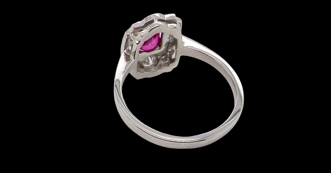 A very pretty ring that features an oval cut pink sapphire, 6x4mm (est 0.50 carats). rear