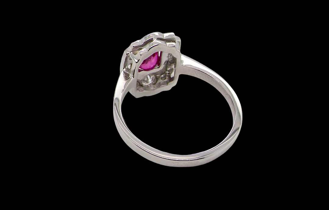 A very pretty ring that features an oval cut pink sapphire, 6x4mm (est 0.50 carats). rear