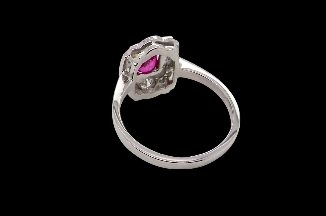A very pretty ring that features an oval cut pink sapphire, 6x4mm (est 0.50 carats). rear