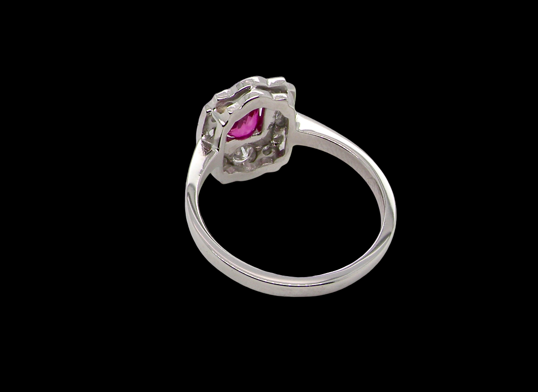 A very pretty ring that features an oval cut pink sapphire, 6x4mm (est 0.50 carats). rear