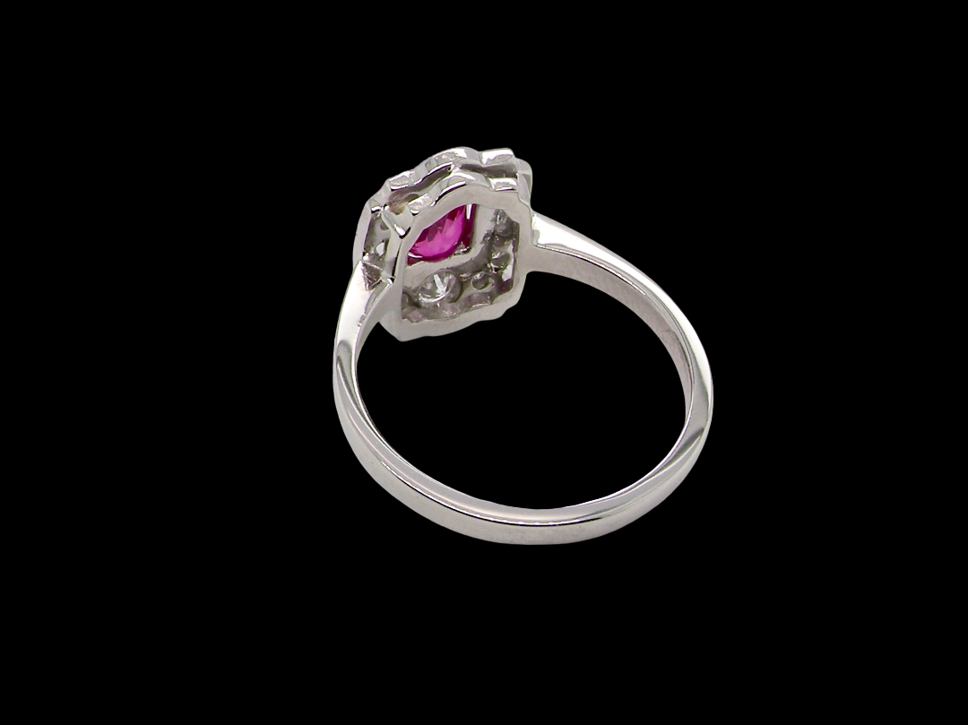 A very pretty ring that features an oval cut pink sapphire, 6x4mm (est 0.50 carats). rear