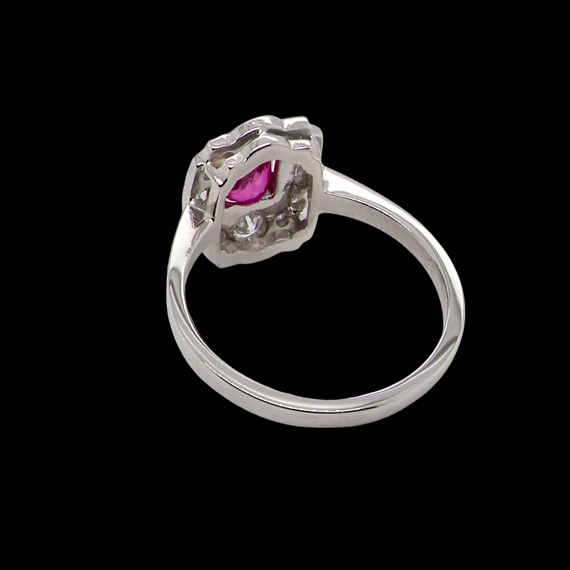 A very pretty ring that features an oval cut pink sapphire, 6x4mm (est 0.50 carats). rear