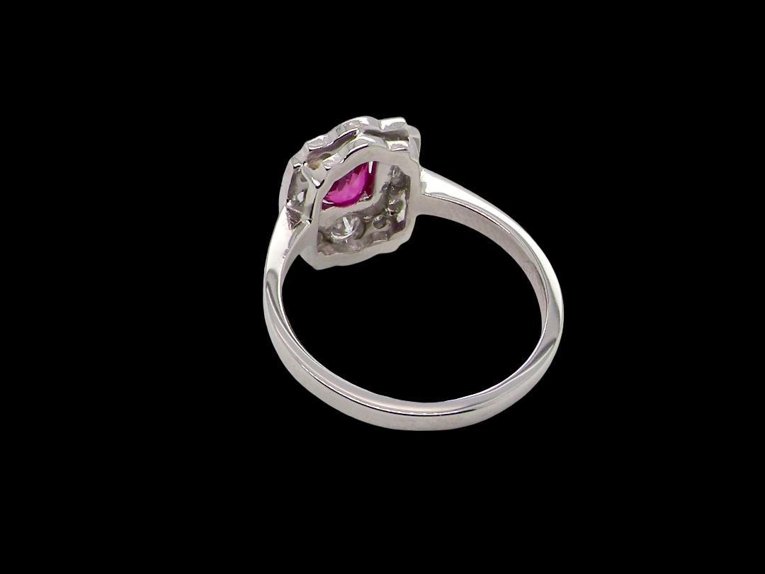 A very pretty ring that features an oval cut pink sapphire, 6x4mm (est 0.50 carats). rear