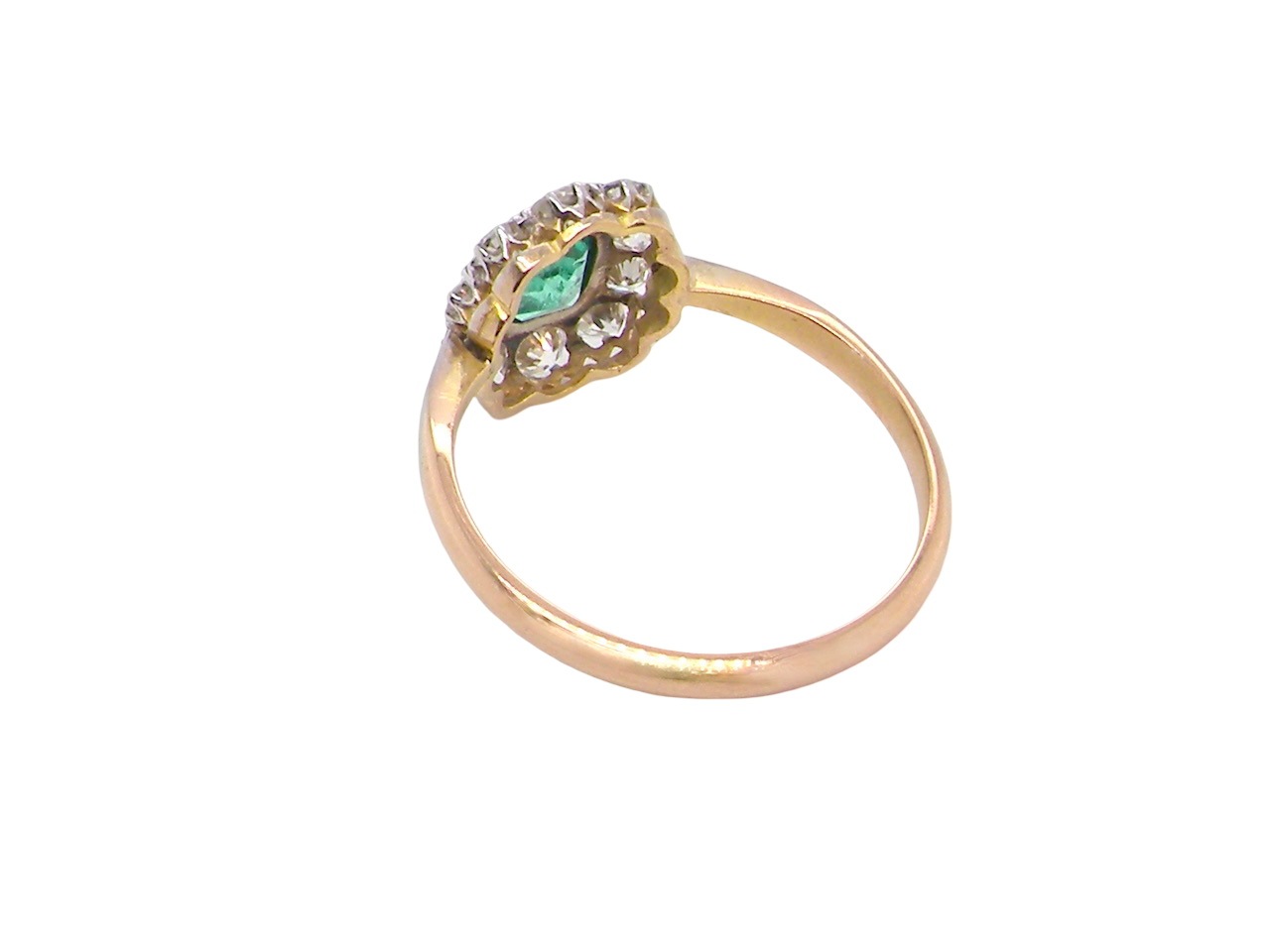 rear A vintage cluster ring, the centre stone a cushion shaped emerald 4x3.5mm, mid to dark green colour. Mille grain setting.