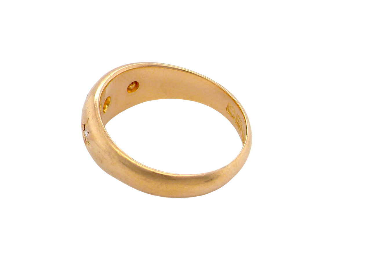 Gold ring with small diamonds on a white background