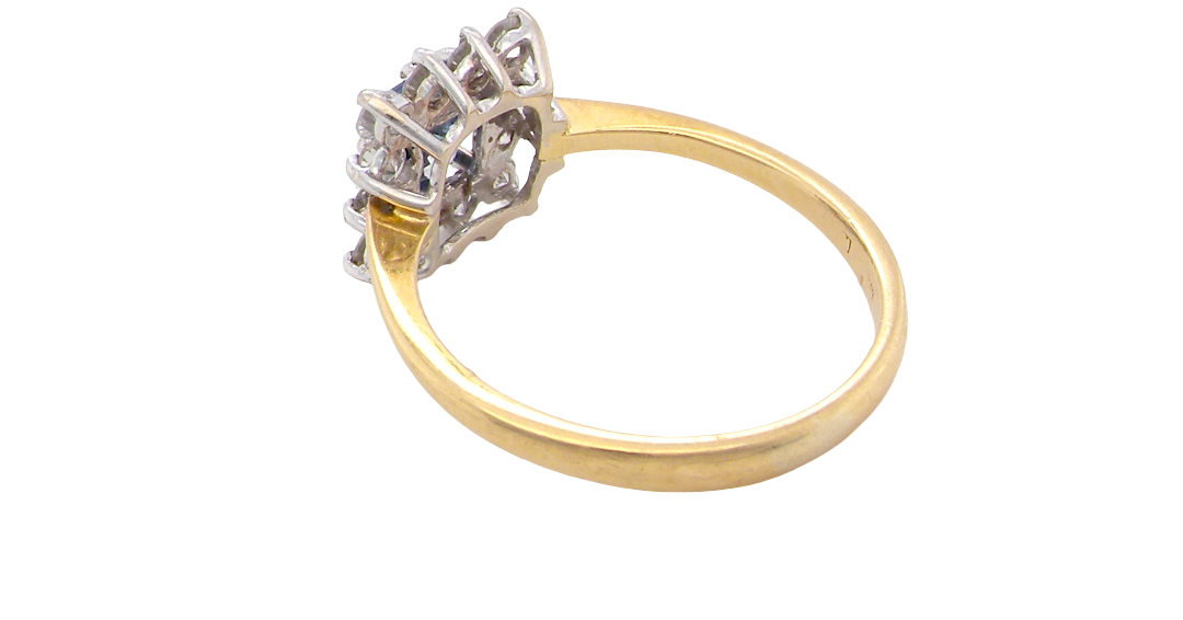 rear A vintage square cluster ring. Features to the centre a square sapphire 5x5mm (est 0.50 carats) mid blue- cornflower hue. 