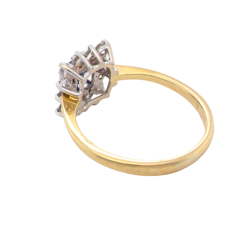 rear A vintage square cluster ring. Features to the centre a square sapphire 5x5mm (est 0.50 carats) mid blue- cornflower hue. 