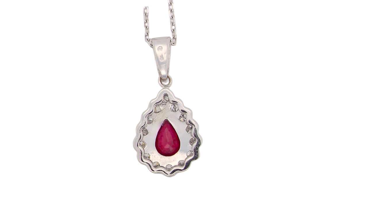 An 18 Carat White Gold Ruby and Diamond Pendant
