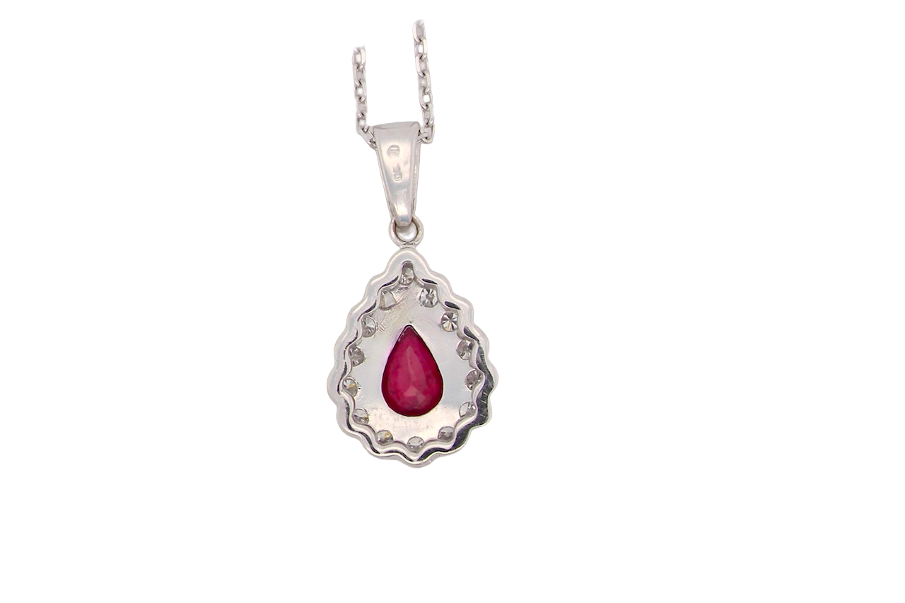 An 18 Carat White Gold Ruby and Diamond Pendant