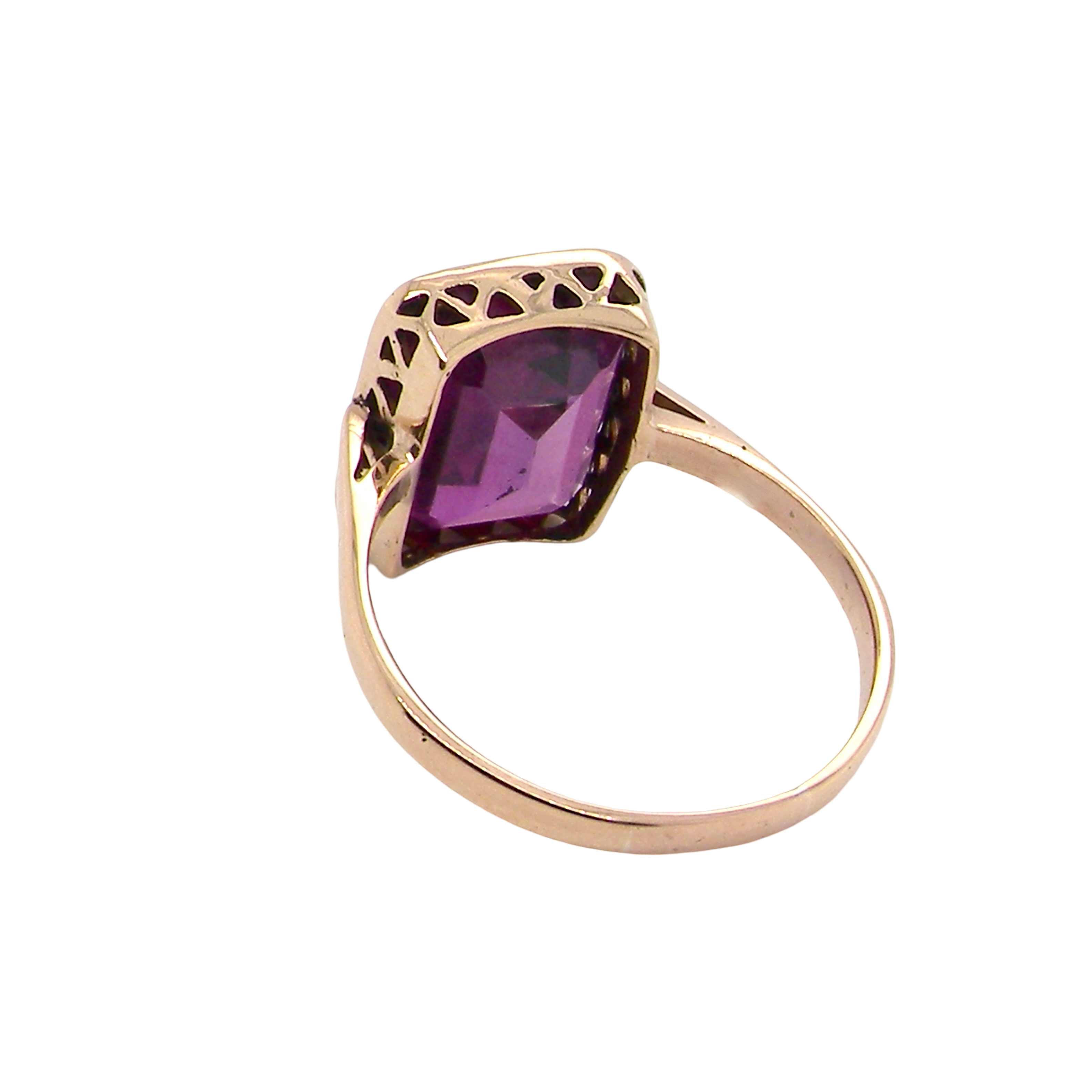 rear An antique dress ring that features a rectangular cut amethyst. Very dark purple, measures 12x10mm. Rim setting.
