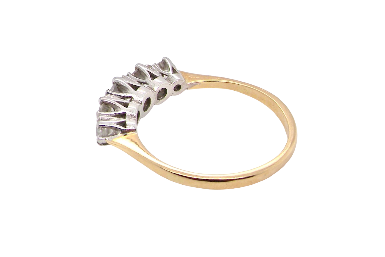 rear An antique five-stone ring dating from the early 20th century,