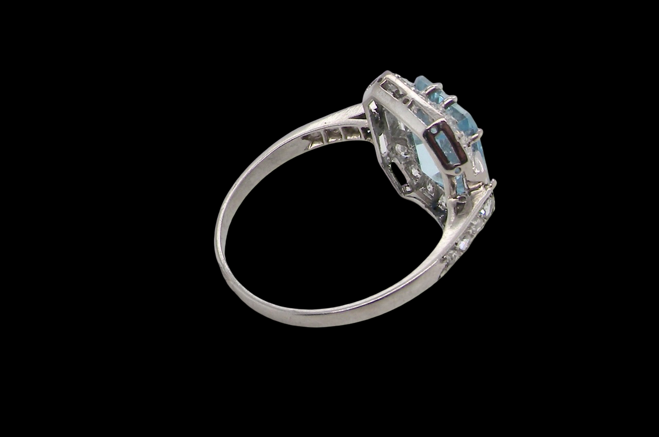 rear An elegant French Art Deco cluster ring in platinum (tests as), dating to circa 1930–1940 and bearing French control marks.