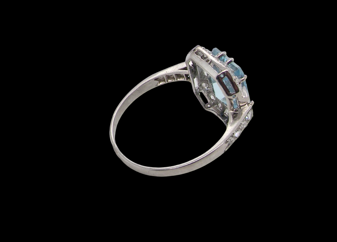 rear An elegant French Art Deco cluster ring in platinum (tests as), dating to circa 1930–1940 and bearing French control marks.