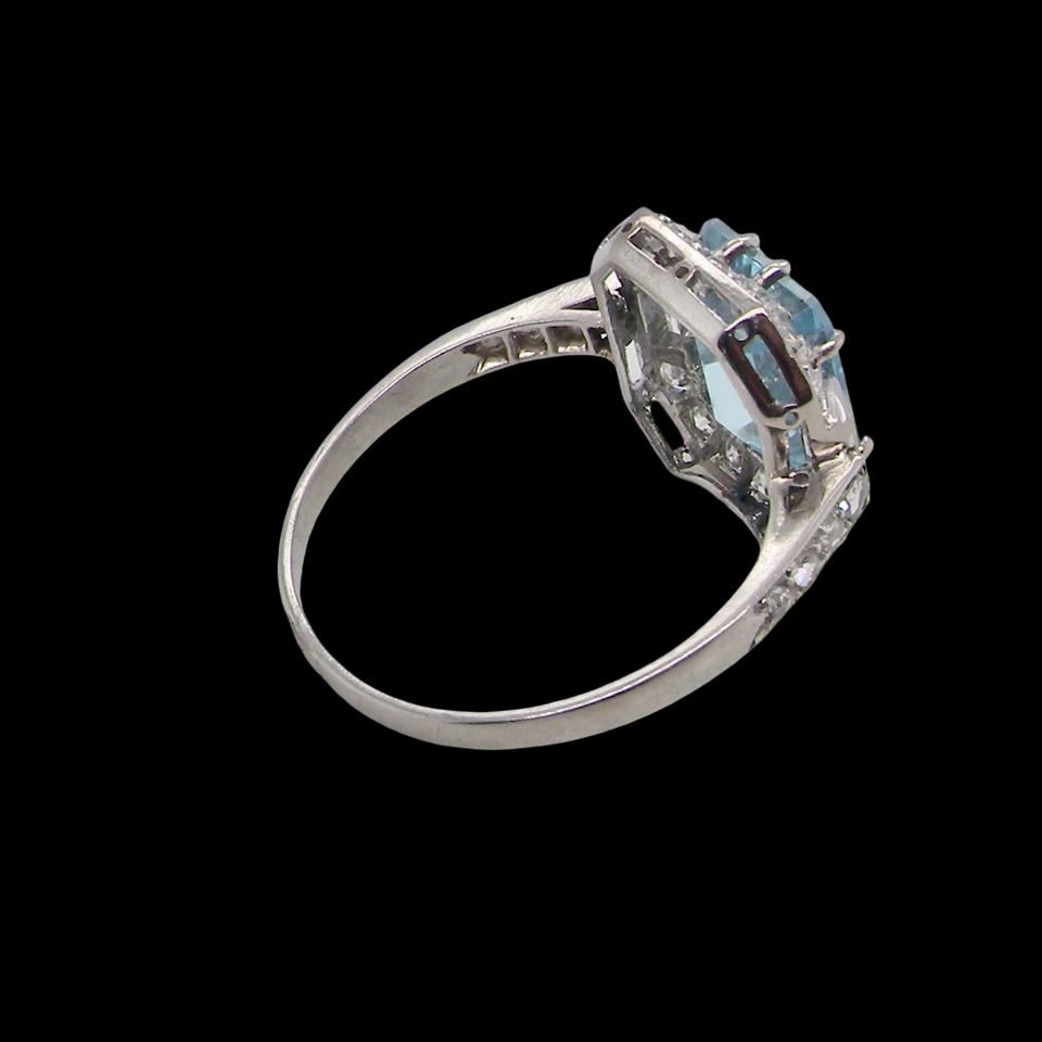 rear An elegant French Art Deco cluster ring in platinum (tests as), dating to circa 1930–1940 and bearing French control marks.