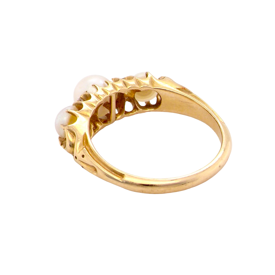 rear An elegant Victorian 18 carat gold* dress ring, set with three cultured pearls