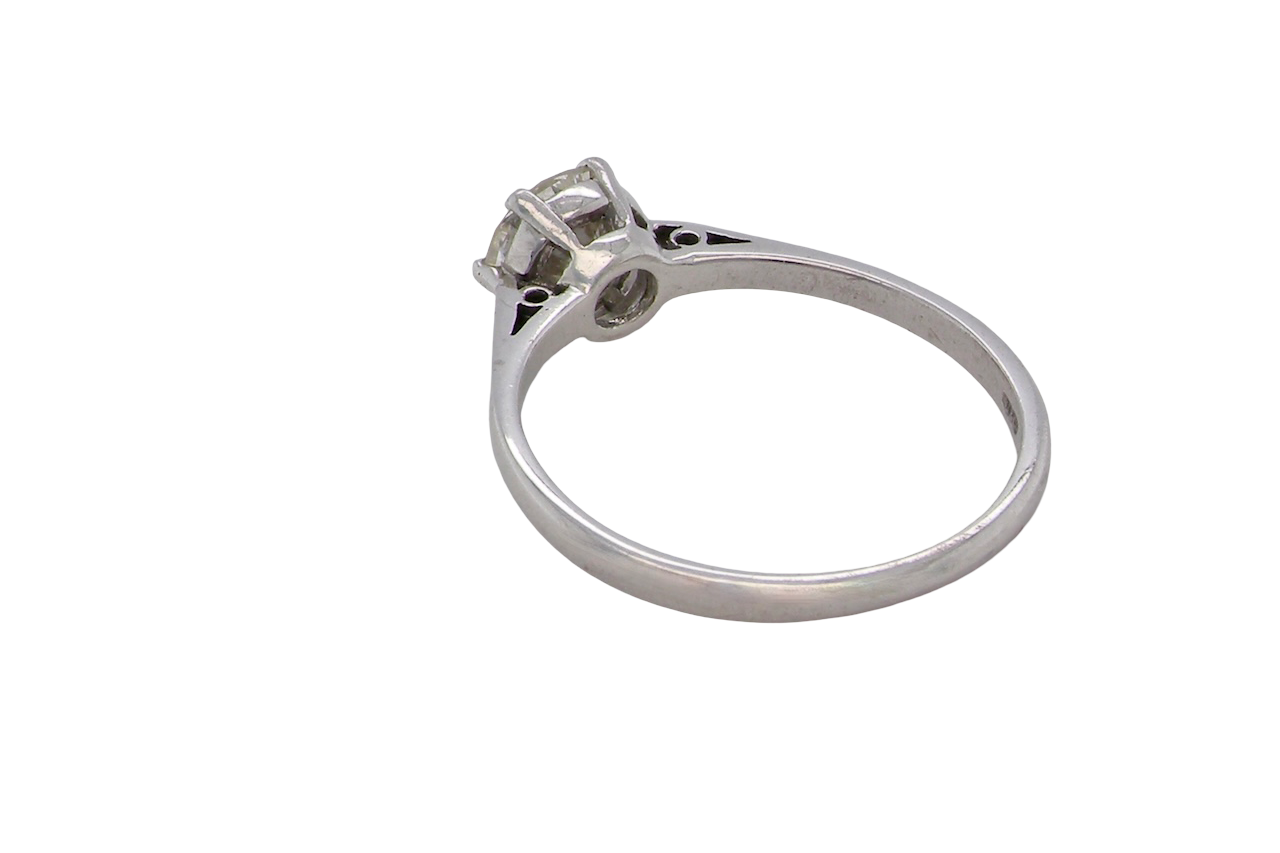 rear An elegant single-stone solitaire ring set with an exceptional brilliant-cut white diamond, estimated at approximately 0.91 carats.
