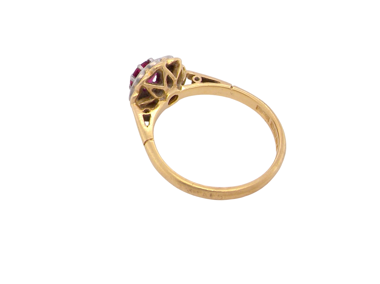 rear An exquisite vintage cluster ring centred around a 5 mm ruby,( 0.50 carats)
