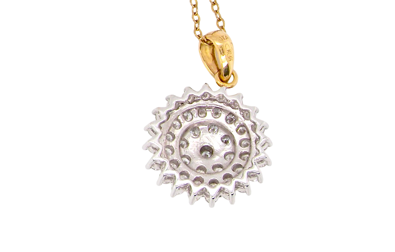 rear An impressive diamond pendant, set with multiple round brilliant-cut diamonds,