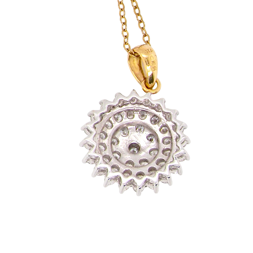 rear An impressive diamond pendant, set with multiple round brilliant-cut diamonds,