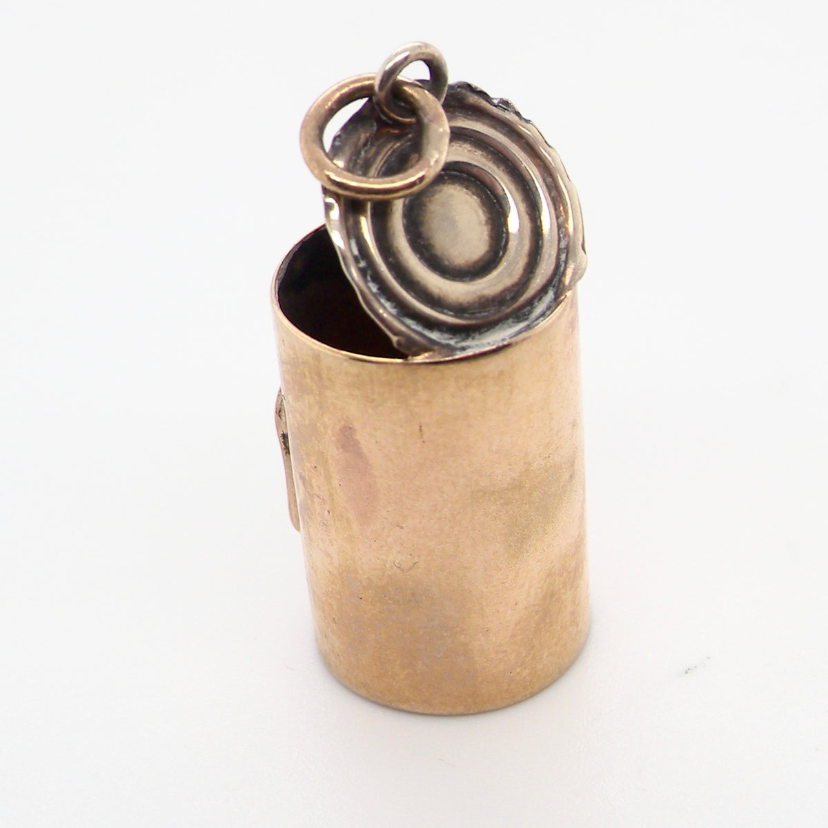 rear An unusual 9 carat gold charm . Shaped as a baked bean can,