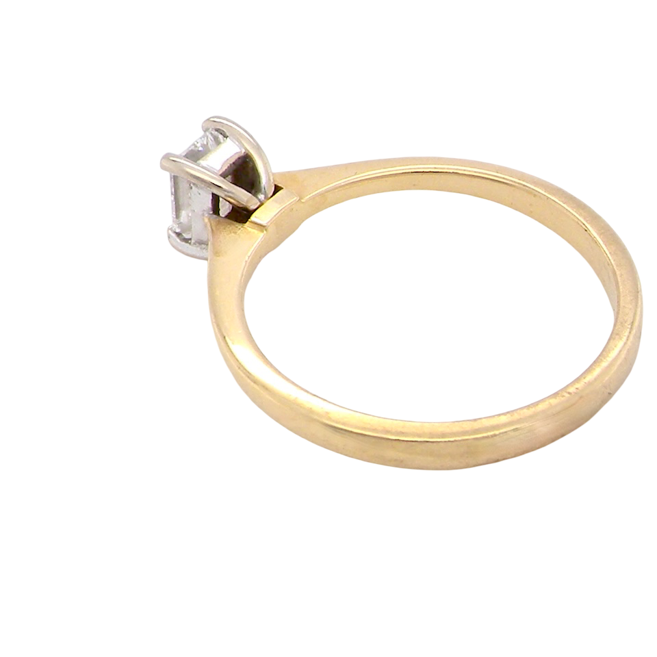 rear Elegant and timeless, this solitaire ring features a beautifully cut emerald-cut diamond measuring 5 x 4mm, confirmed at approximately 0.40 carats. The diamond is graded J colour and VS clarity, offering excellent sparkle and impressive clarity for everyday wear or a meaningful occasion piece.
