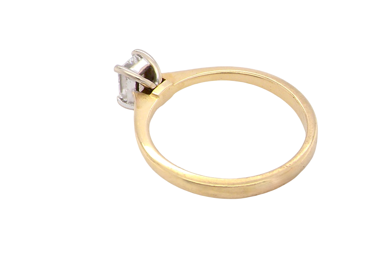 rear Elegant and timeless, this solitaire ring features a beautifully cut emerald-cut diamond measuring 5 x 4mm, confirmed at approximately 0.40 carats. The diamond is graded J colour and VS clarity, offering excellent sparkle and impressive clarity for everyday wear or a meaningful occasion piece.