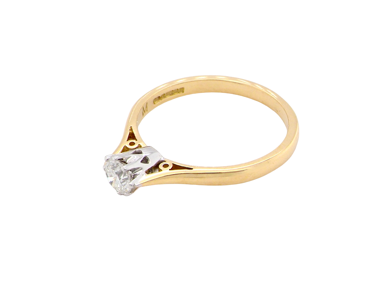 Gold ring with a diamond on a white background