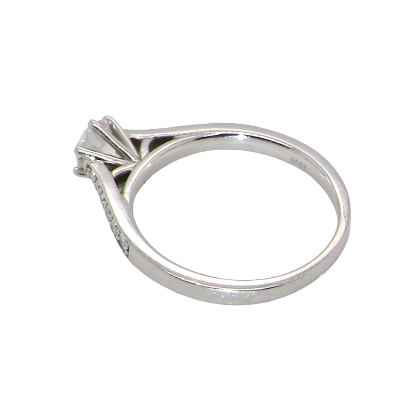 rear beautiful platinum solitaire ring featuring a brilliant-cut white diamond, claw set, measuring 4.8mm and weighing approximately 0.65ct. Diamond graded I colour, SI1 clarity, with an 88-facet cut.