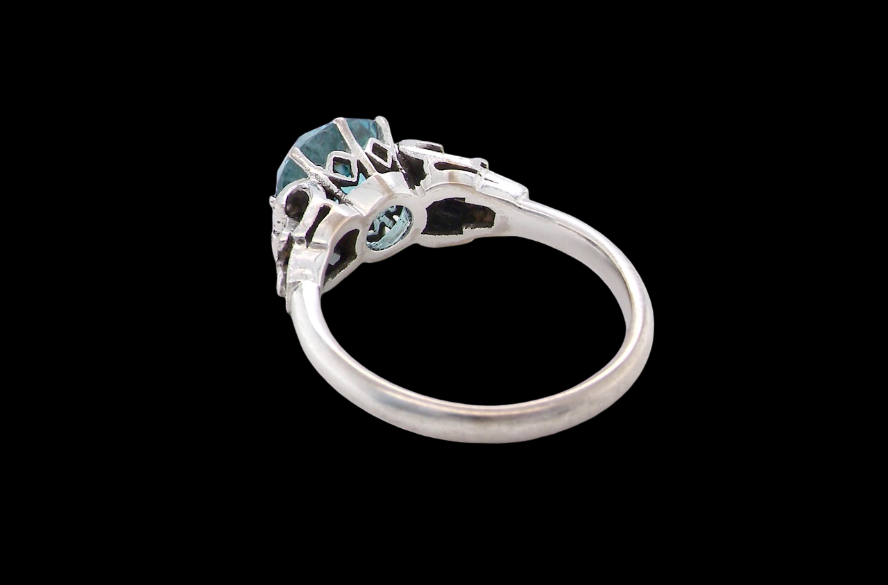 rear fine Art Deco ring that features a stunning natural blue zircon centre stone