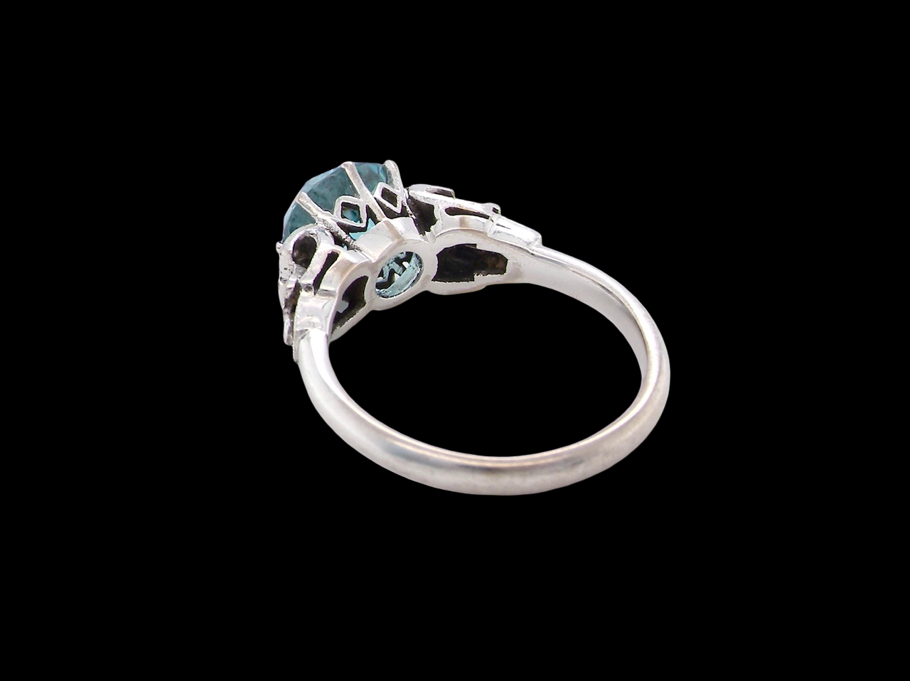 rear fine Art Deco ring that features a stunning natural blue zircon centre stone