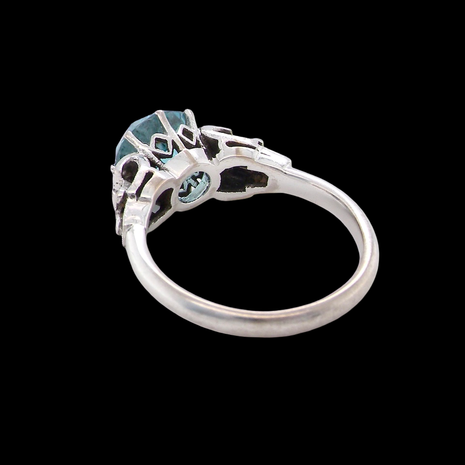 rear fine Art Deco ring that features a stunning natural blue zircon centre stone