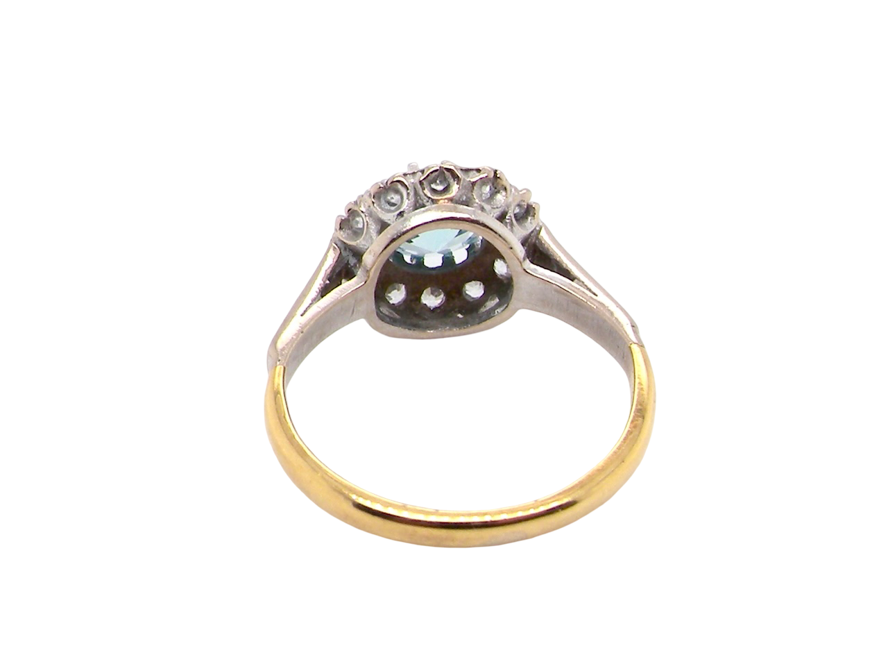 rear fine vintage cluster ring. The centre stone a natural blue zircon, 7mm diameter, bright sparkling refraction to the sky blue hue. 