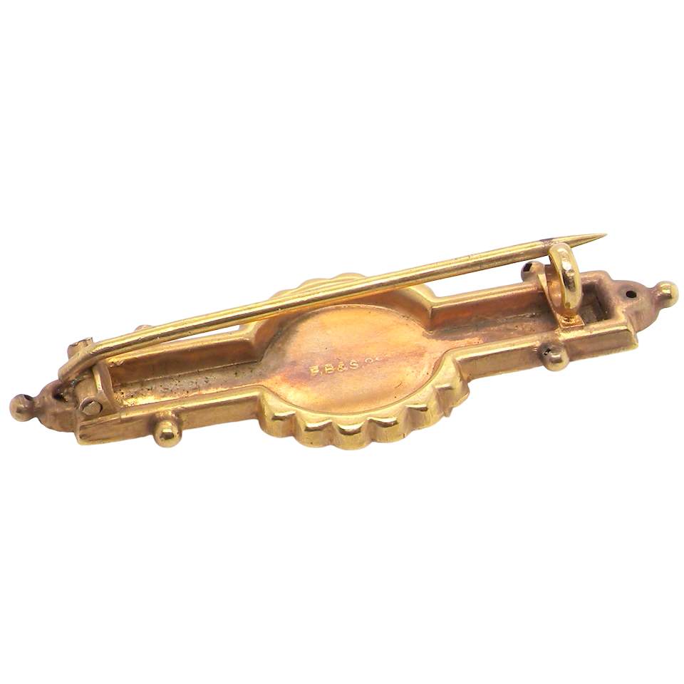 rear of A pretty late Victorian bar brooch. Applied piqué work makes this brooch so attractive and is very much of the period.