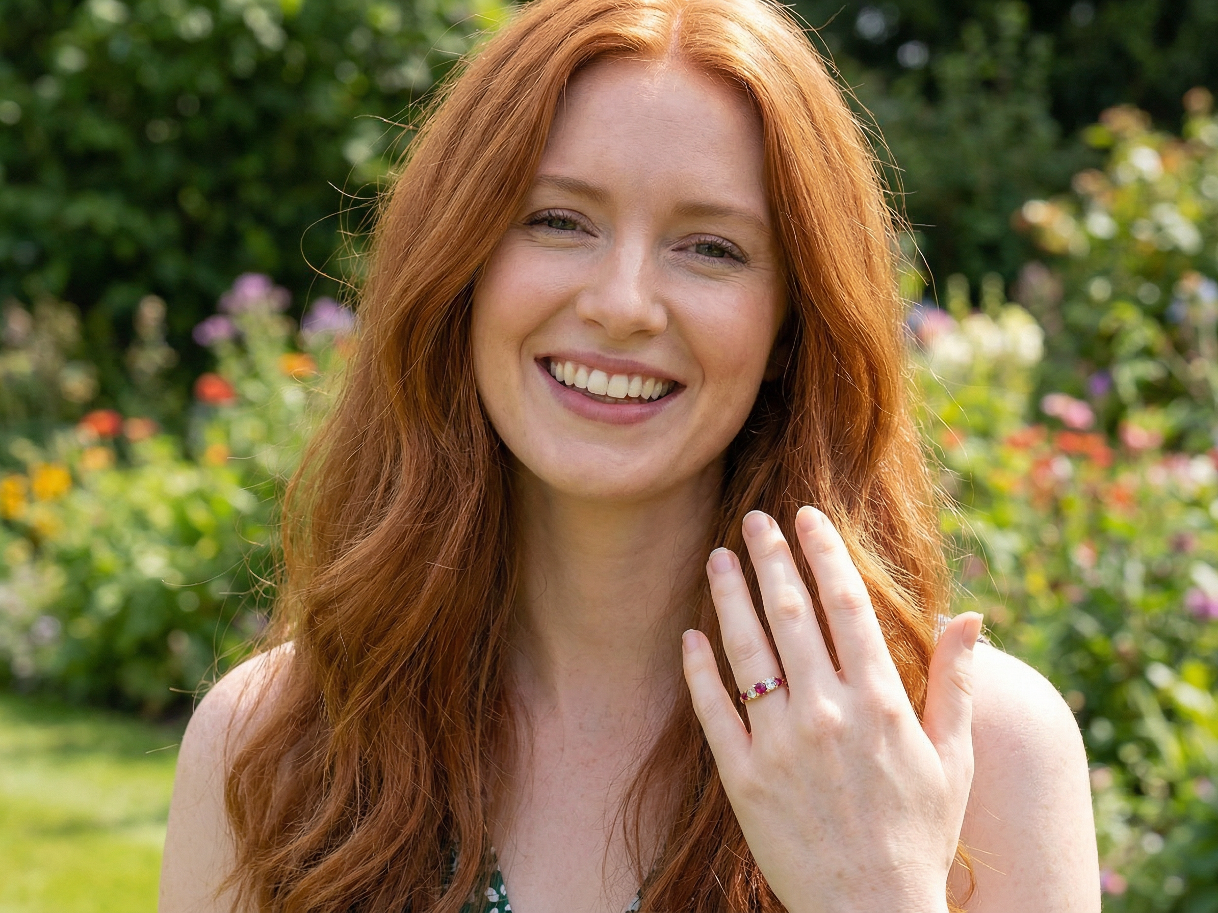red head with A superb Victorian ring, carved boat shaped head. Set with three fine rubies ,