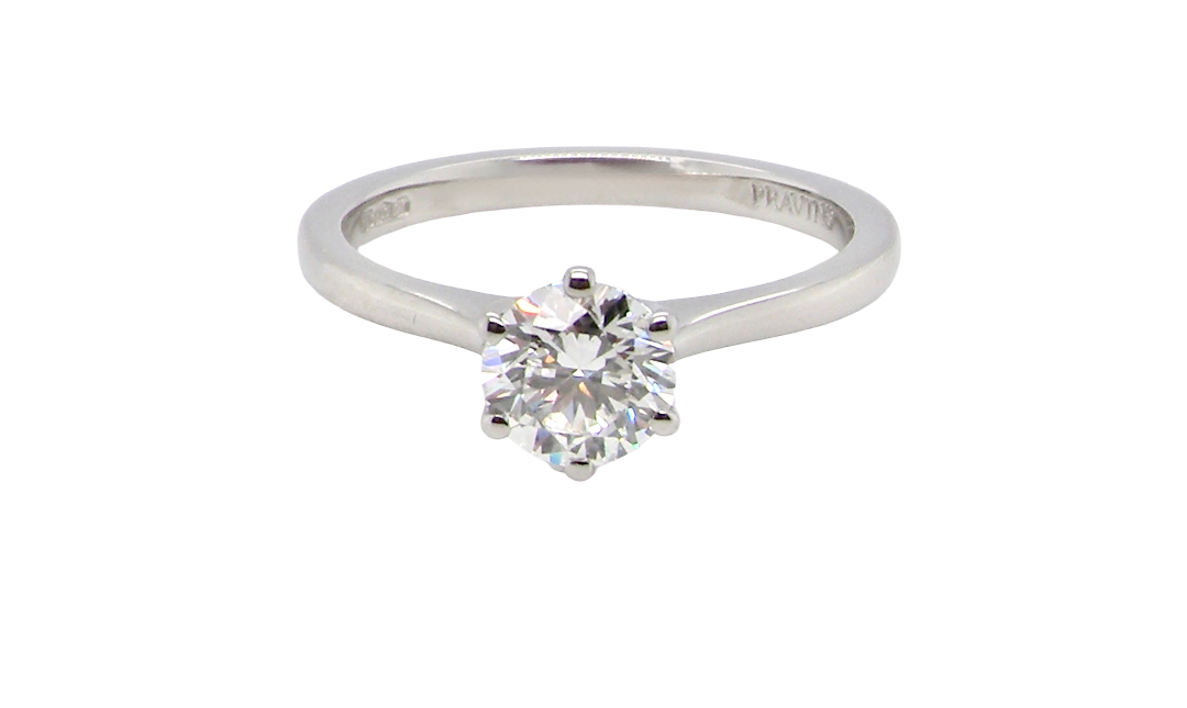 ring is set with a superb GIA-certified brilliant-cut diamond, certificate no. 1383174901, weighing 0.70 carat. The diamond is of exceptional quality, graded D colour and VVS1 clarity, with excellent cut and polish . Measurements: 5.48 x 5.67mm.