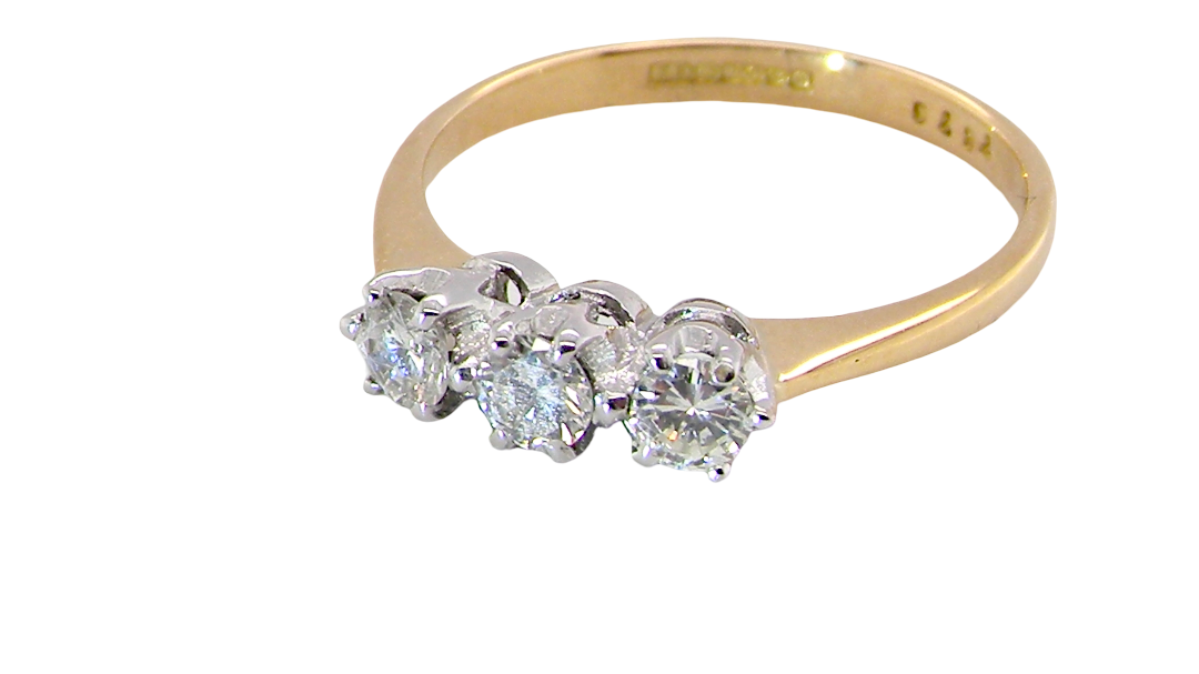 ring is set with three brilliant cut white diamonds, each 3mm diameter. (total estimated at 0.30 carats) Colour h-j, Claw set head, white gold,
