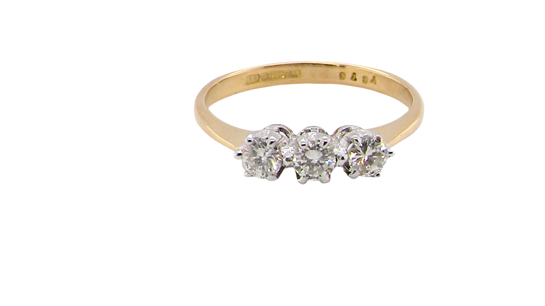 ring is set with three brilliant cut white diamonds, each 3mm diameter. (total estimated at 0.30 carats) Colour h-j, clarity Si. Claw set head, white gold,