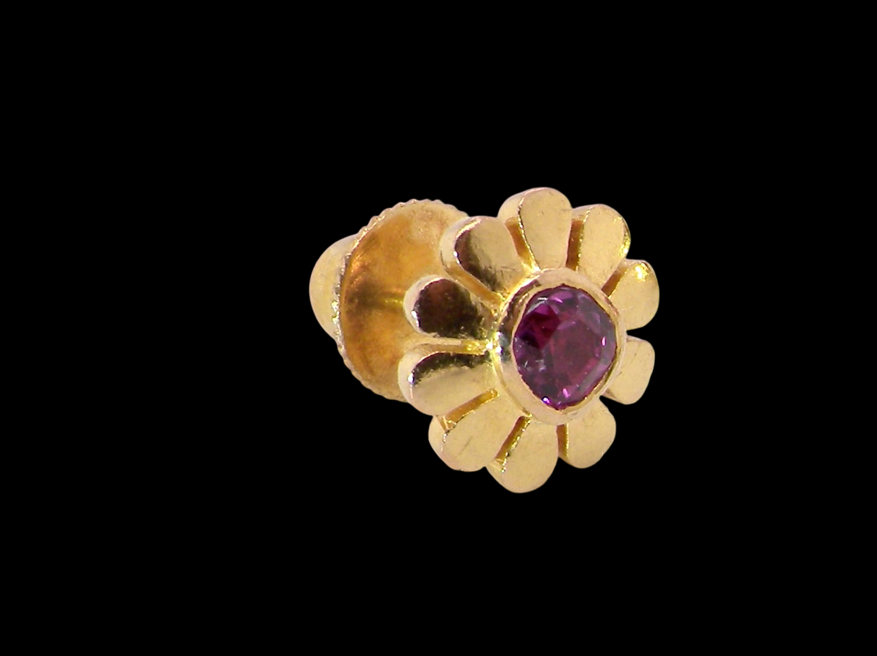 ruby earring.Each earring is centred with a cushion-shaped ruby measuring approximately 3.6–3.8mm,