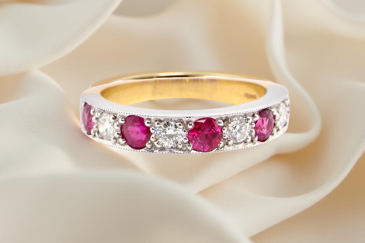 18 carat gold half-hoop eternity ring,