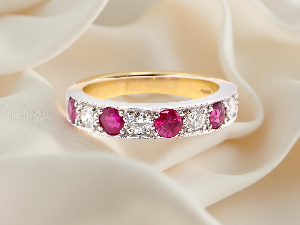 18 carat gold half-hoop eternity ring,