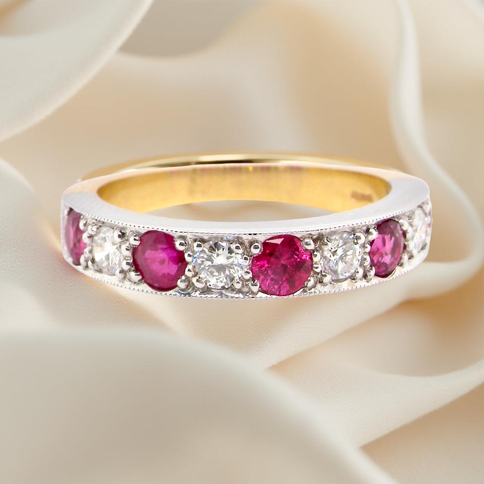 18 carat gold half-hoop eternity ring,